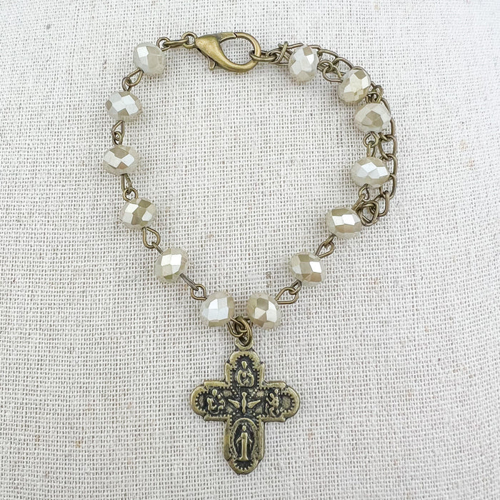 BEADED BRACELET WITH CROSS CHARM